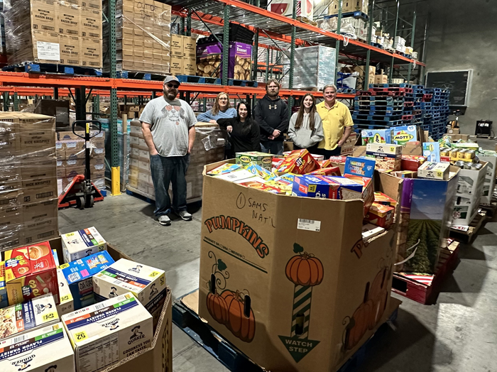Book Systems food drive community involvement